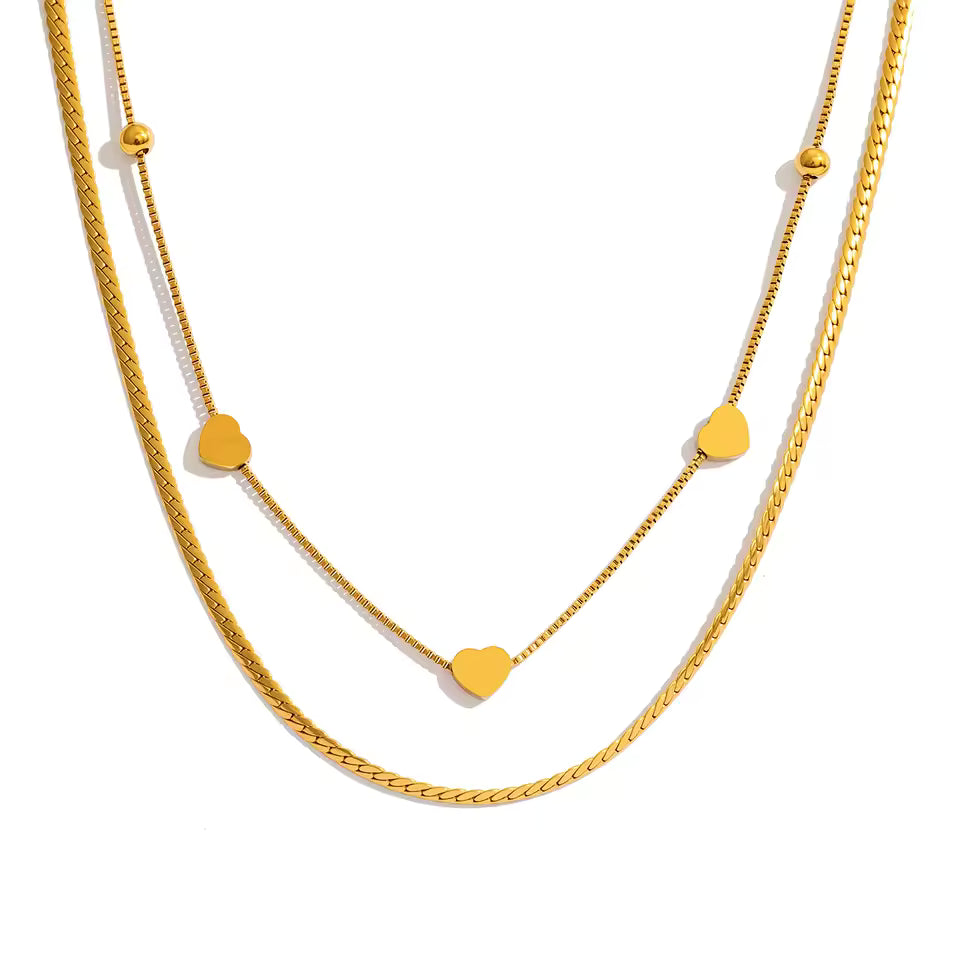 Linked Heart layered gold necklace with polished heart accents