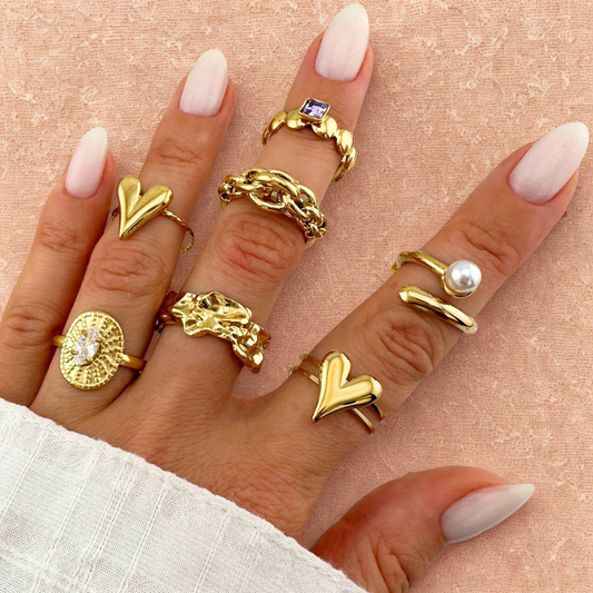 Adjustable gold ring with accent pearl