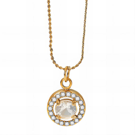 Gold necklace with a round pendant featuring a central gemstone and smaller stones around it on a white background.