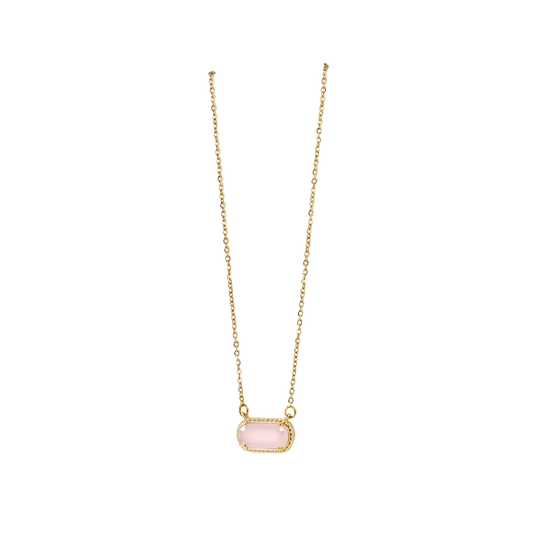 Gold necklace with a pink stone pendant on a white background