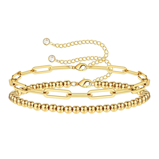 Gold beaded bracelet stacked with neutral tones – Essence Bracelet by 31:10 Jewelry
