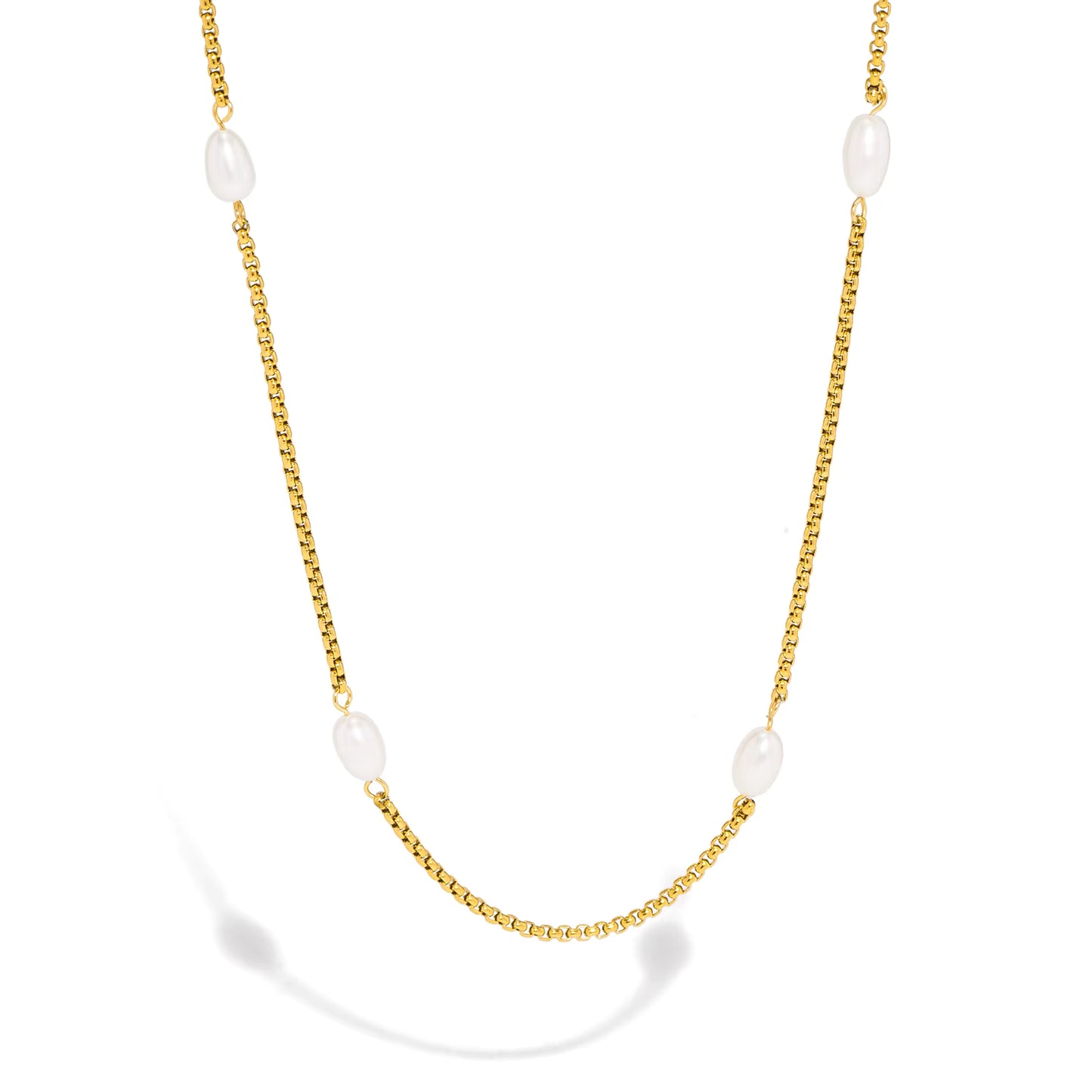Gold necklace with white pearls on a white background