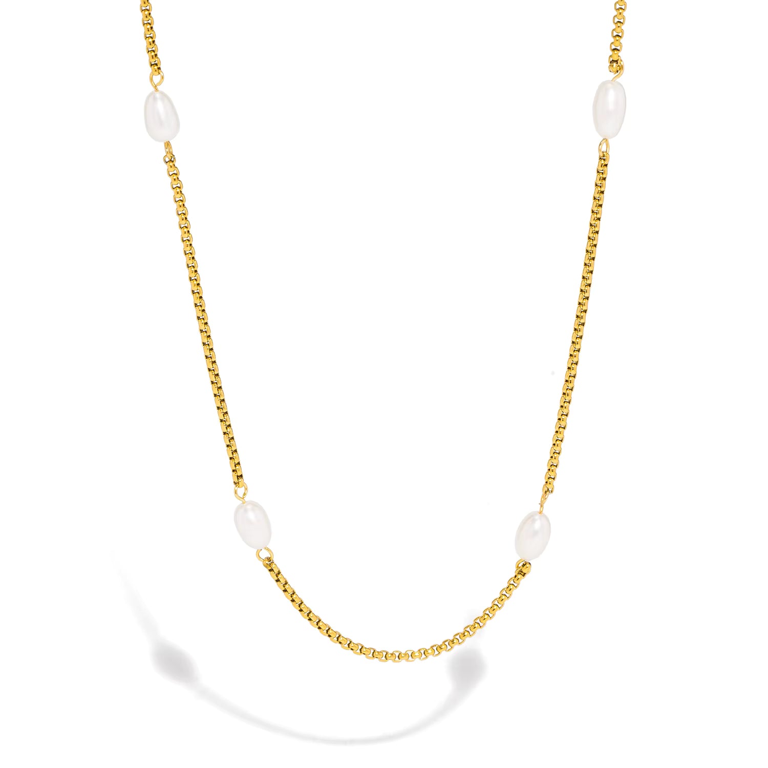 Gold necklace with white pearls on a white background