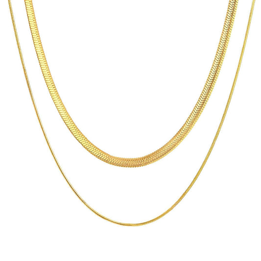 layered gold necklace with sleek double strands in warm gold tones.