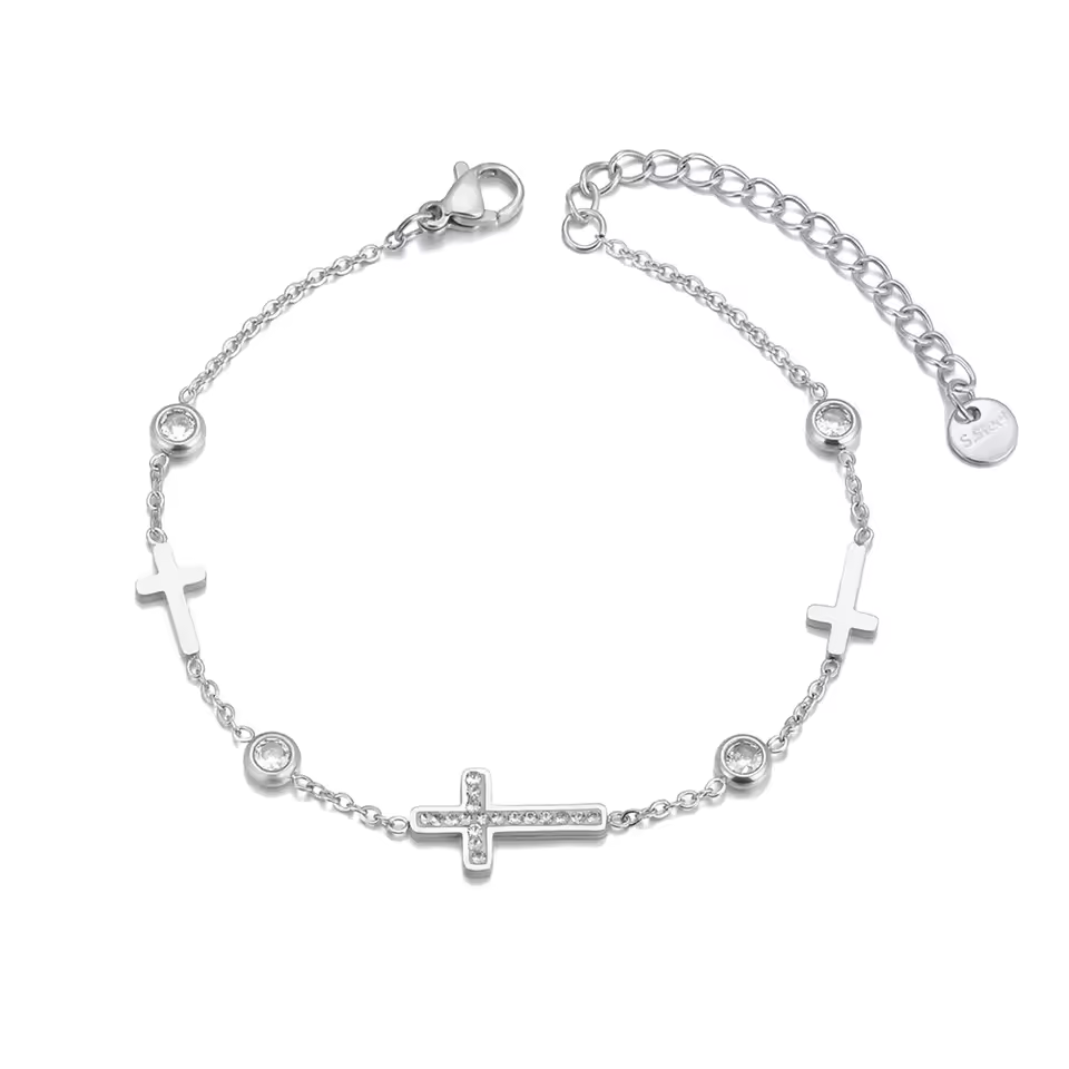 Silver bracelet with cross designs on a white background