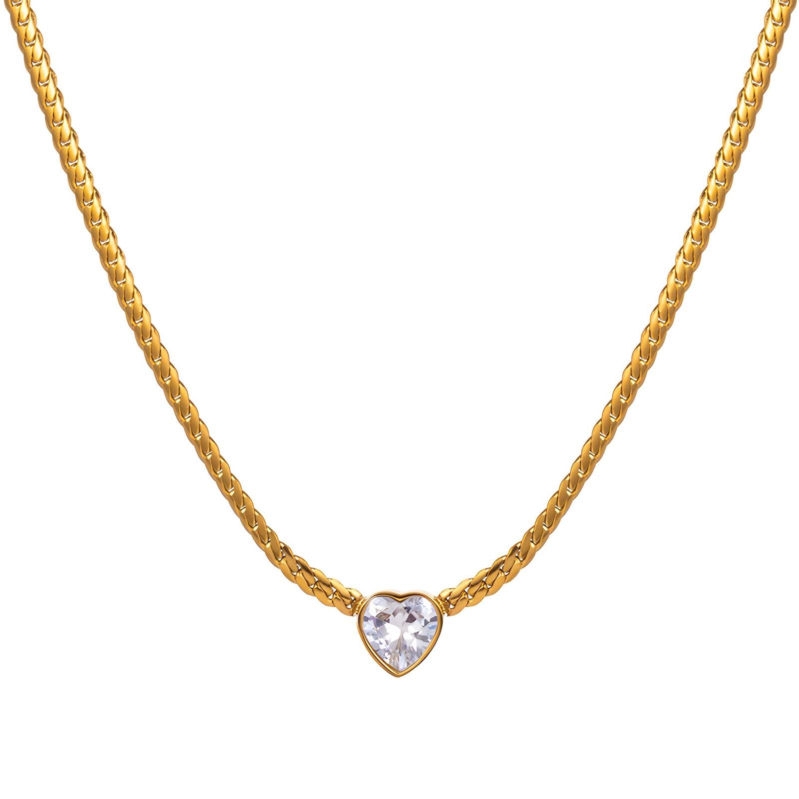 Gold necklace with heart-shaped pendant on model, symbolizing grace and inner light