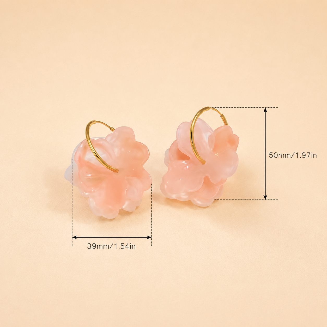 Pair of pink floral earrings with gold loops on a beige background, showing measurements.