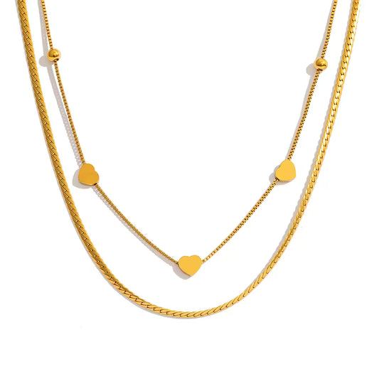 Linked Heart layered gold necklace with polished heart accents