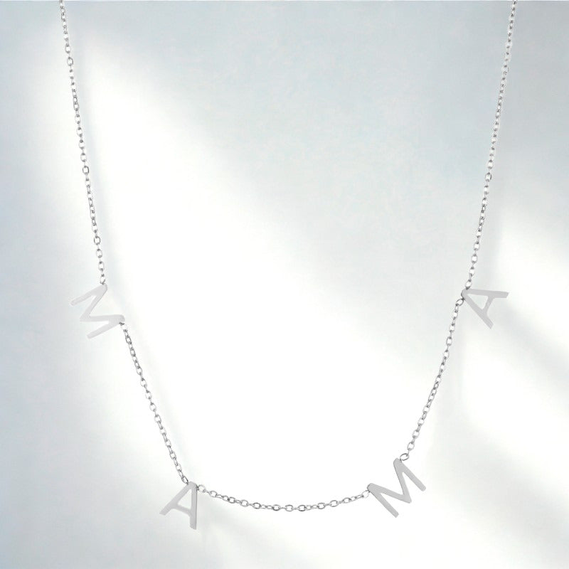 Silver mama necklace with spaced letters on a delicate chain
