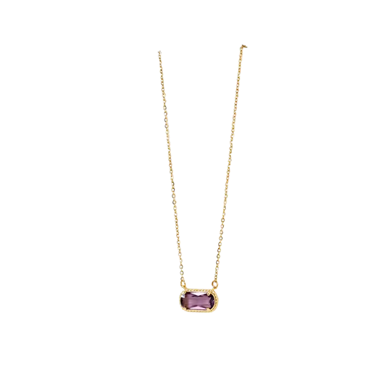 Gold necklace with a purple gemstone pendant on a white background