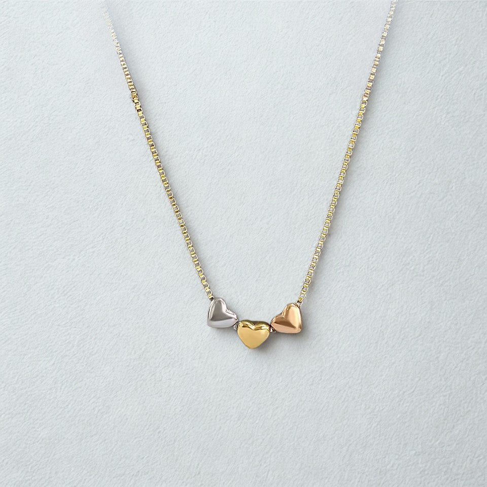 tri color heart necklace with gold silver and rose gold hearts minimalist mixed metal jewelry