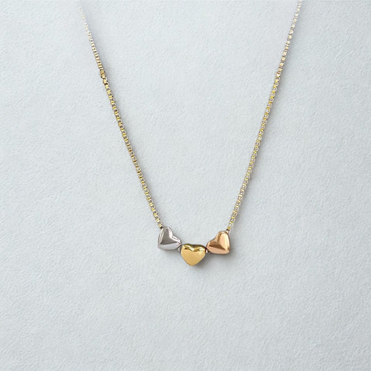 tri color heart necklace with gold silver and rose gold hearts minimalist mixed metal jewelry
