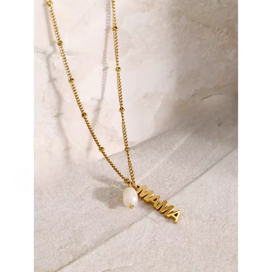 Gold mama name necklace with small pearl charm on a delicate chain